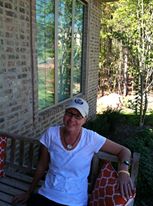 Home, relaxing on the front porch.